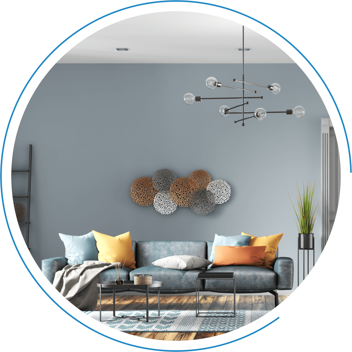 Modern living room with blue sofa and art.
