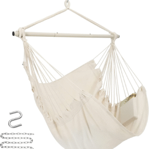 Cream-colored hanging hammock chair with wooden spreader and ropes.